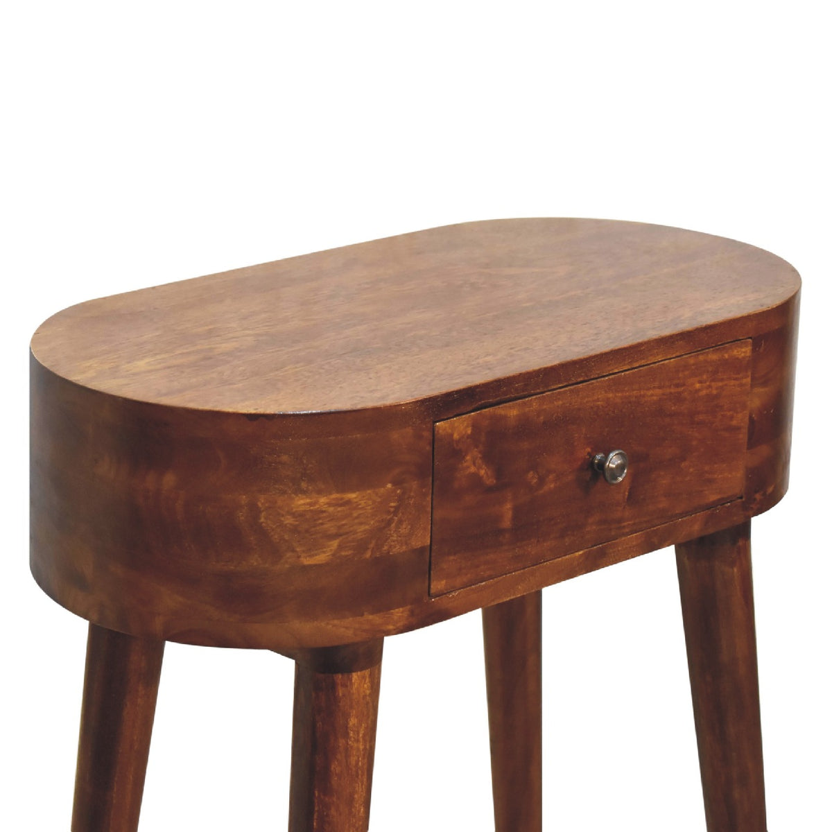 Angled close view of the brown console table's top and closed drawer