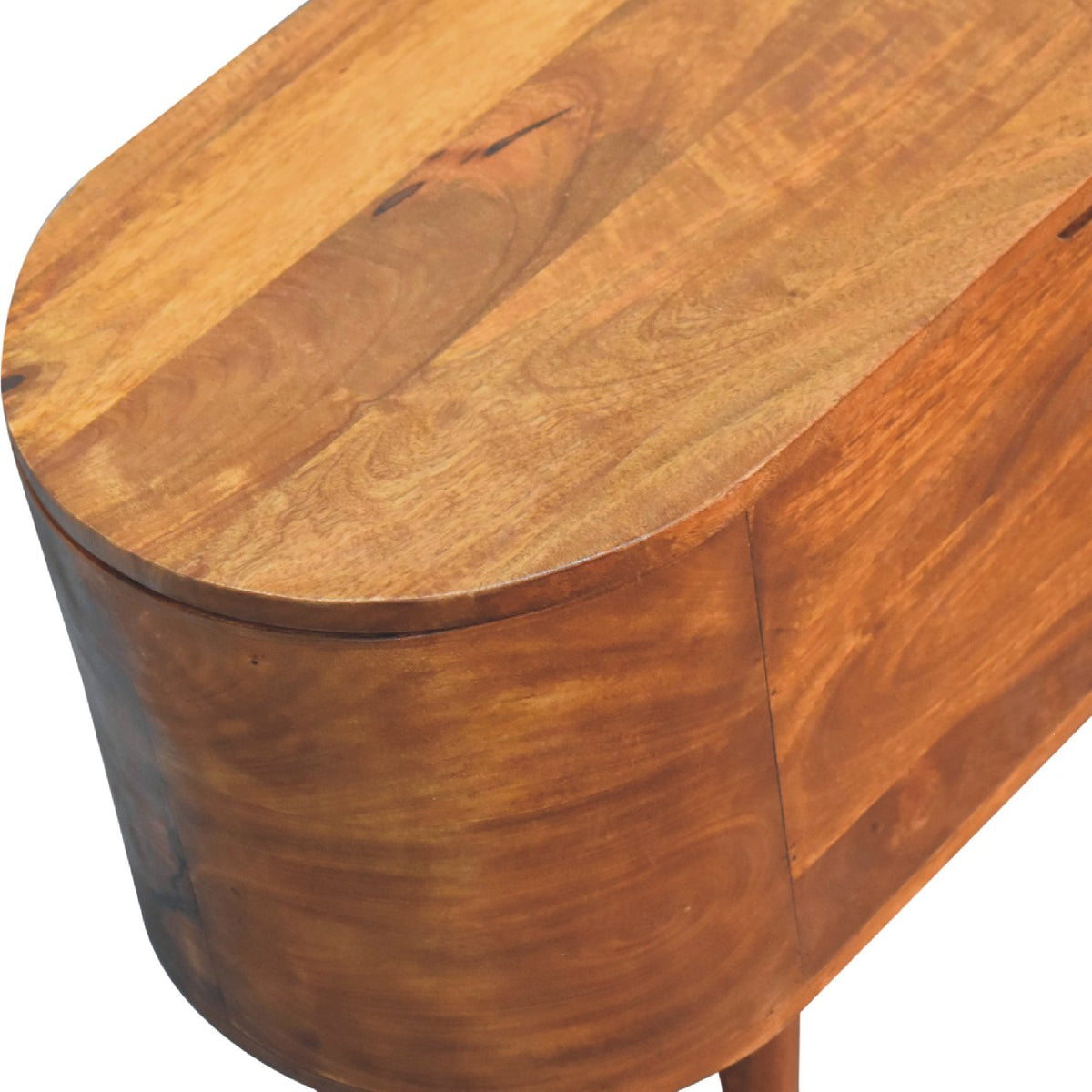 Angled close-up of the rounded chestnut lid and wood grain