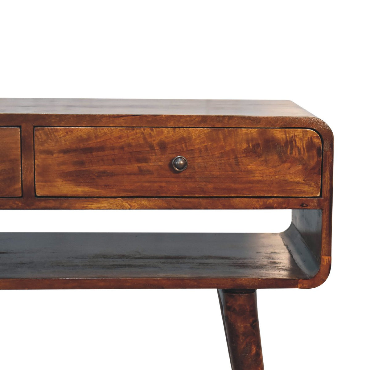 Close-up of a chestnut drawer, shiny knob, curved edge, and open compartment