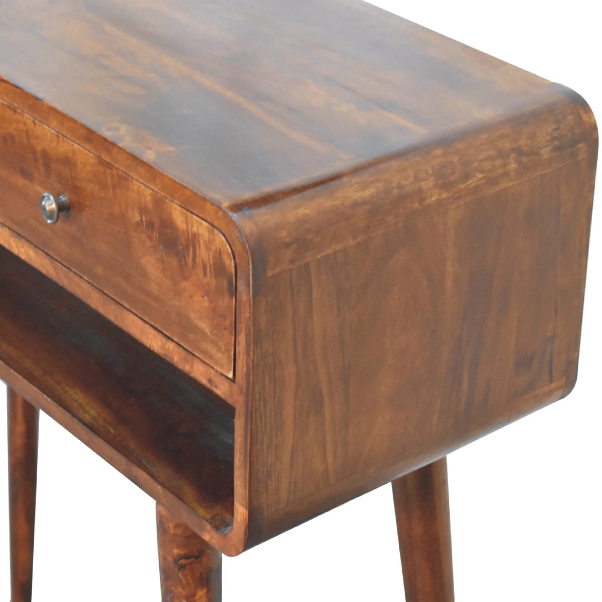 Close-up of the chestnut console table's rounded side and wood grain