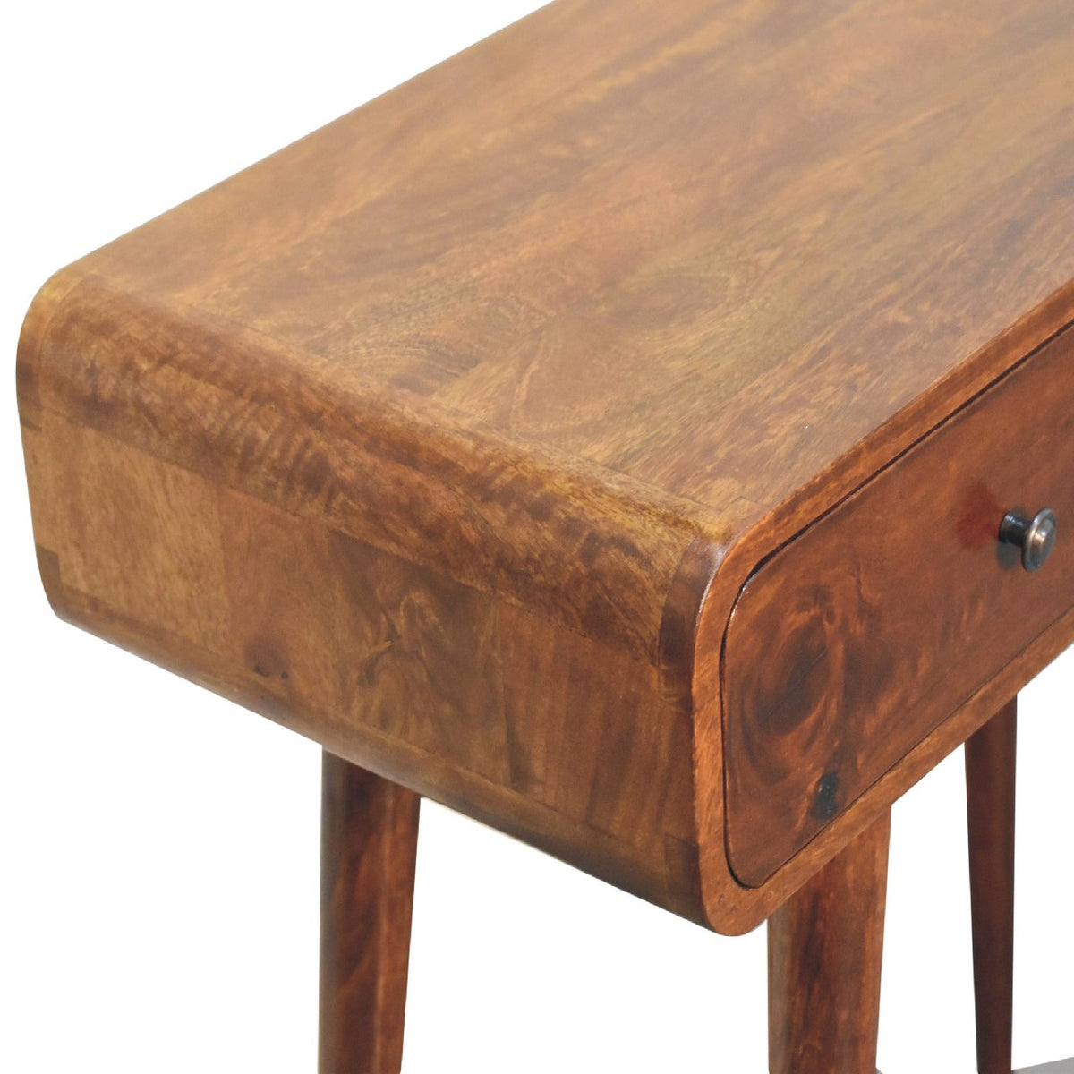 Close-up of the chestnut wood tabletop and rounded corner