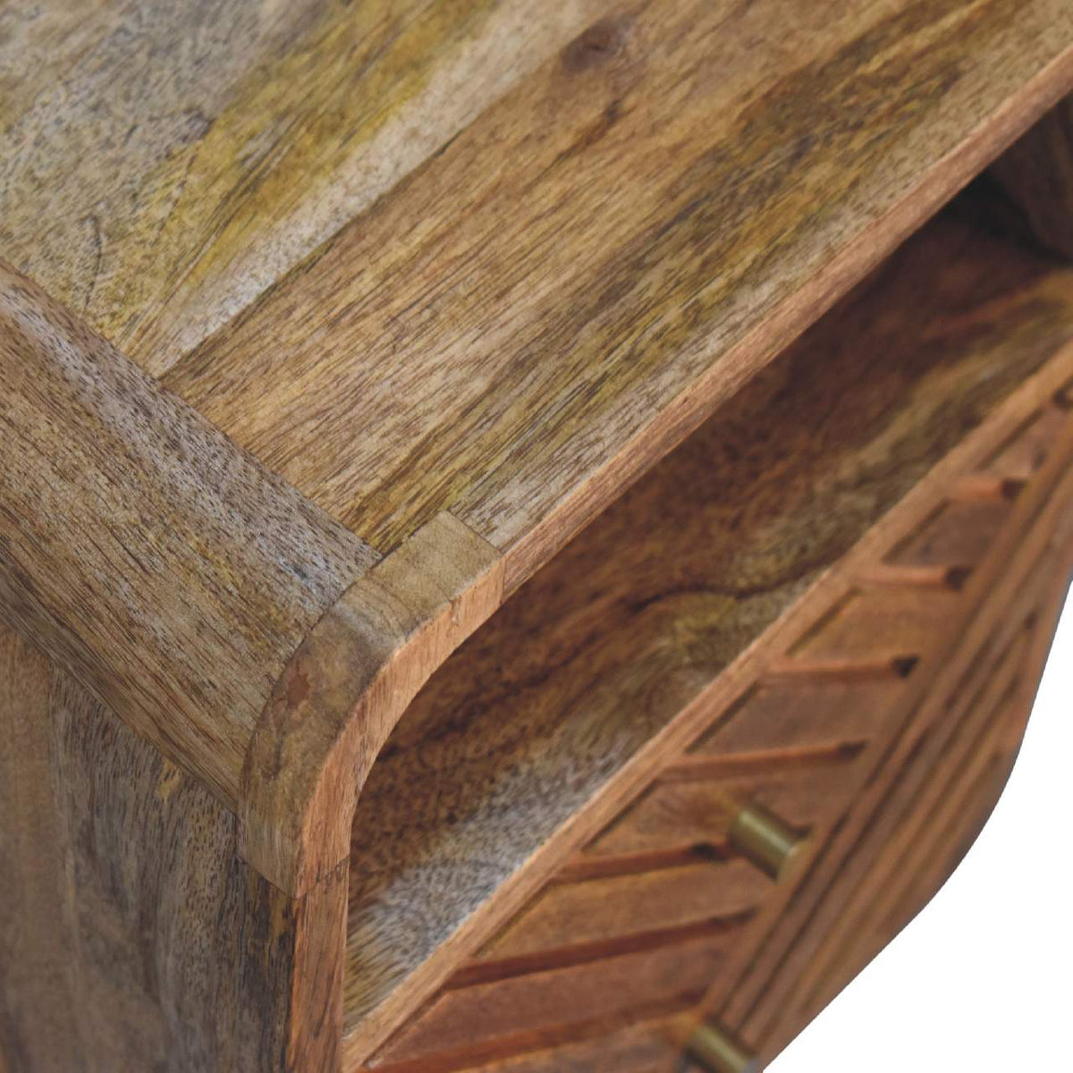 Close-up of the rounded wood top and open shelf on the brown nightstand