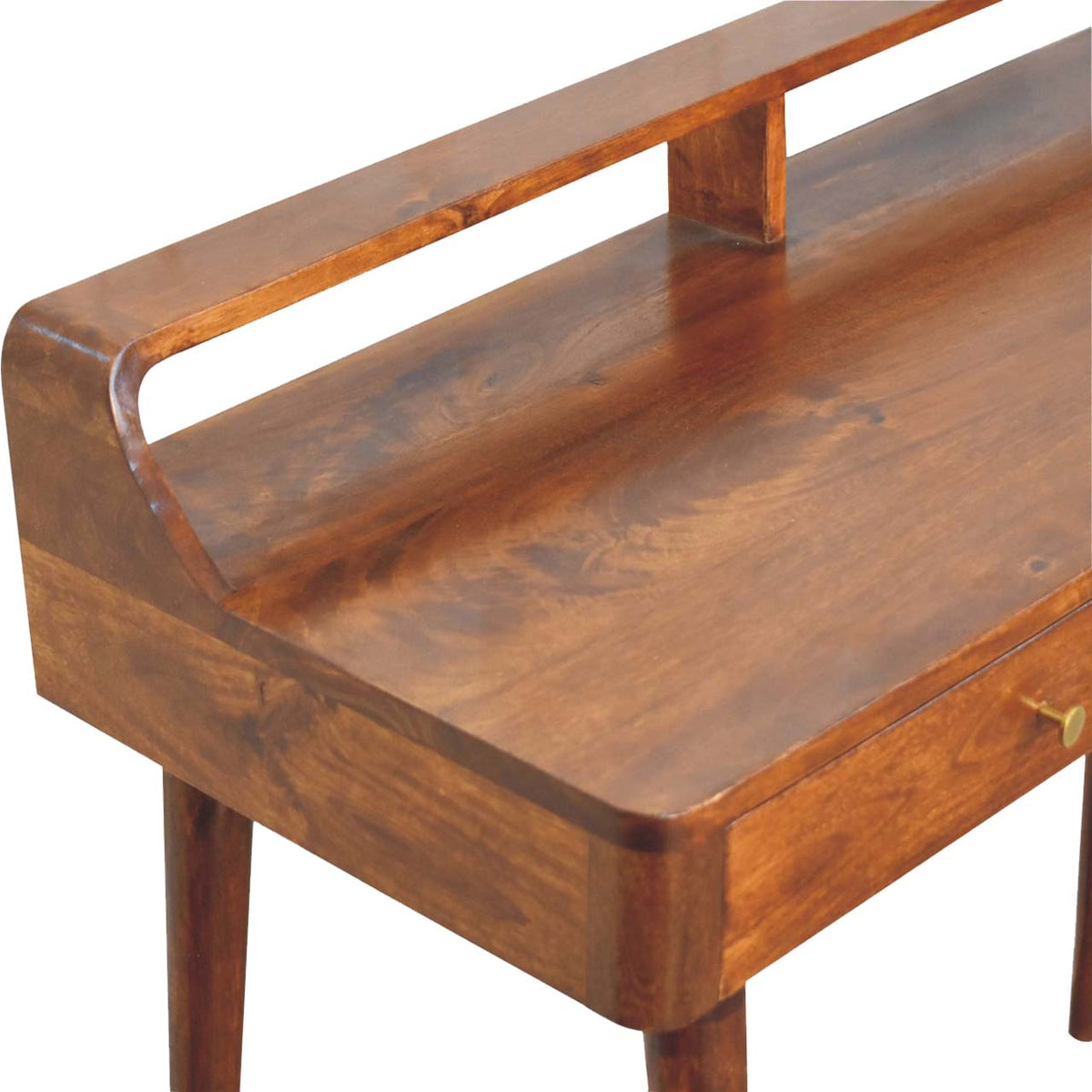 Angled detail of the chestnut tabletop and raised back rail showing the wood grain