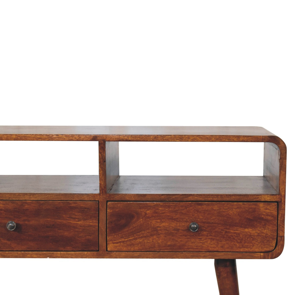 Close view of the console table's open cubby, drawer fronts and rounded side