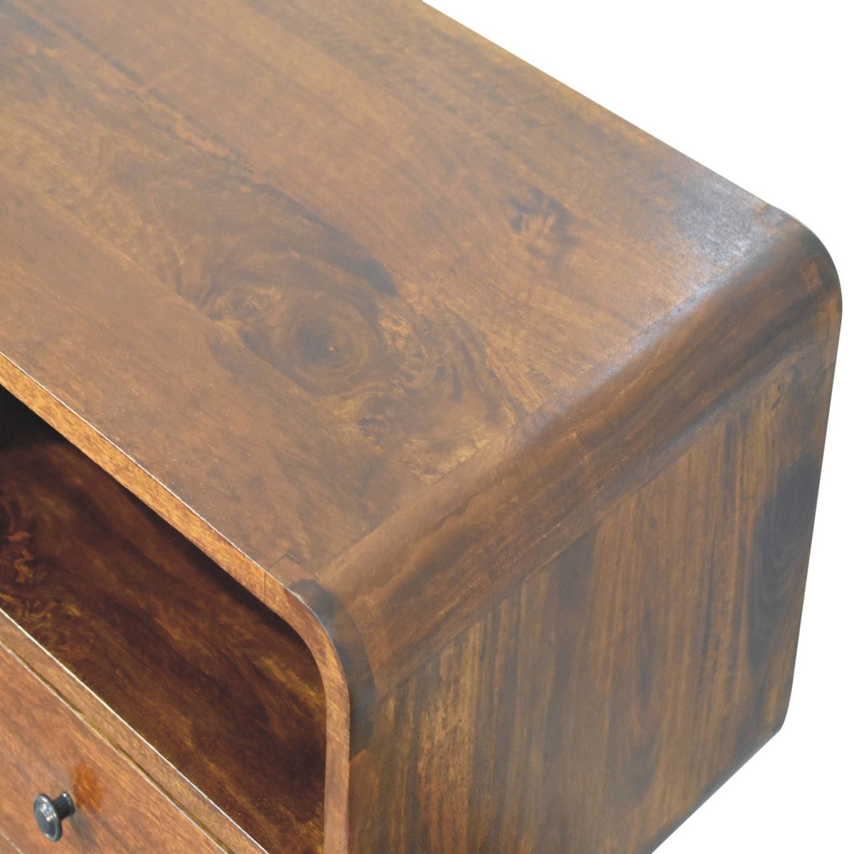Close-up of the chestnut-finished tabletop corner and visible wood grain