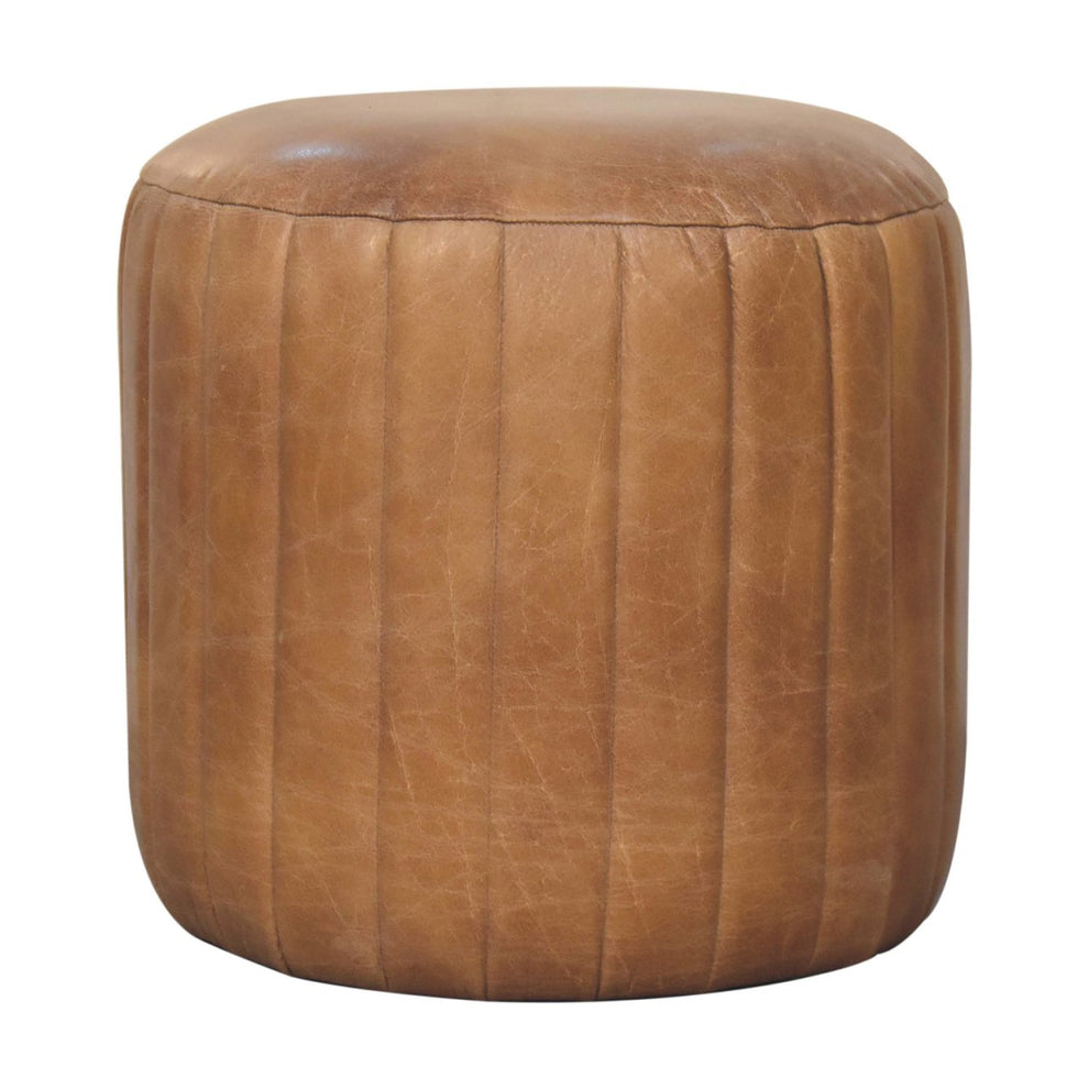 Brown rounded leather footstool shown straight on against a white background