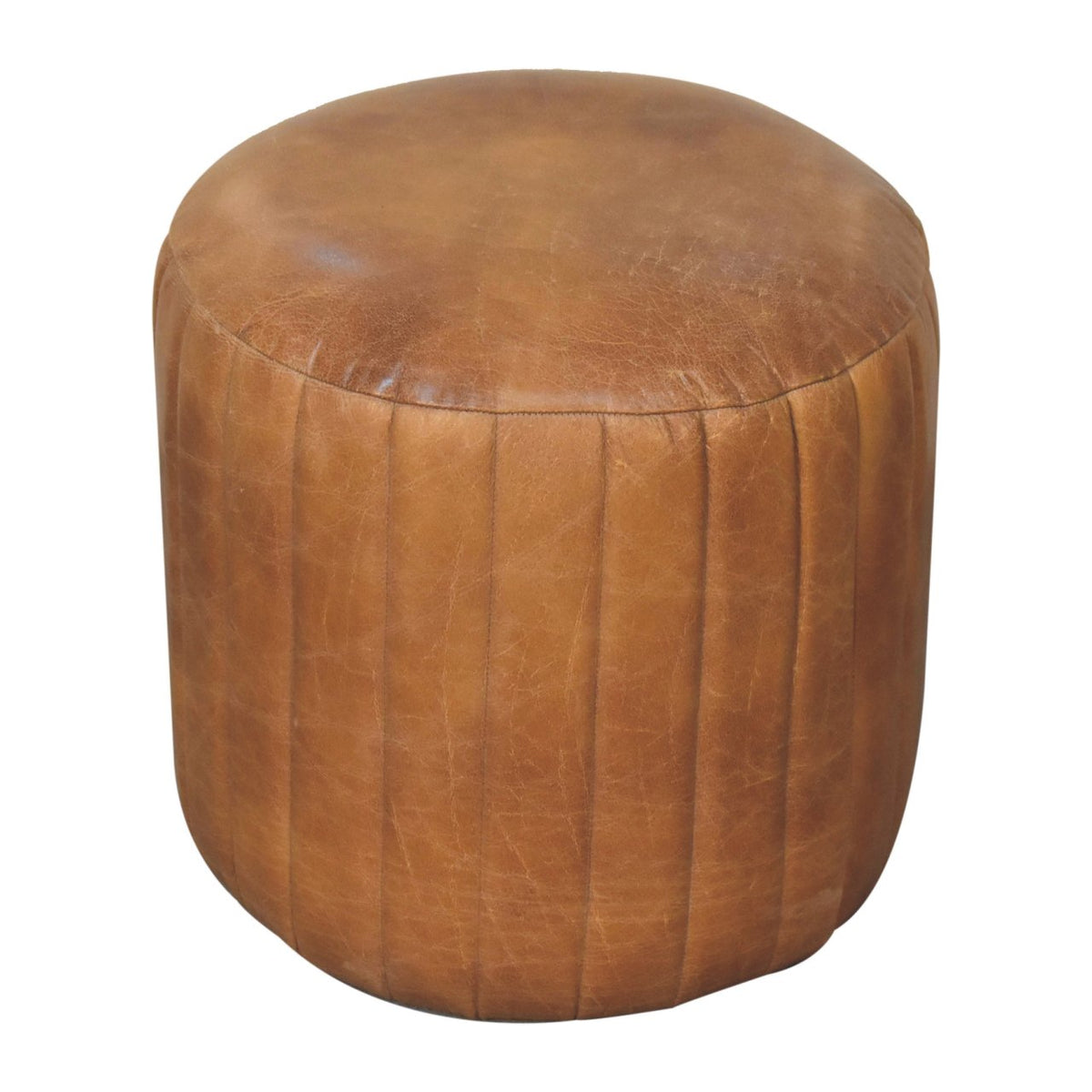 Brown rounded footstool viewed from above at an angle on a white background