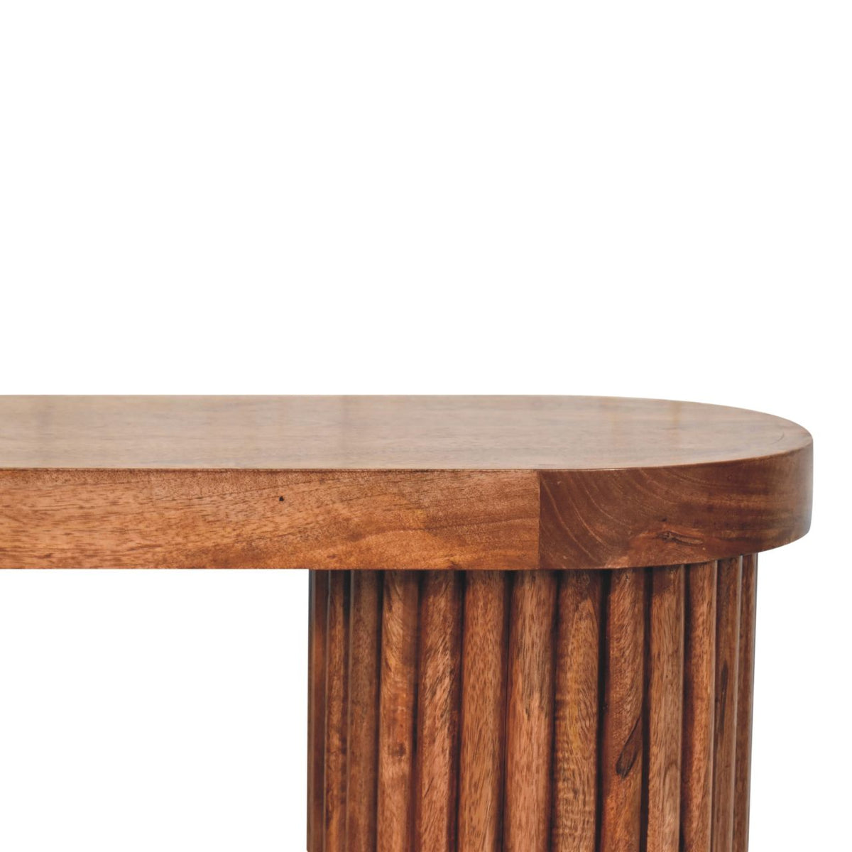 Close-up of the rounded brown tabletop edge above the table's vertical ridged support