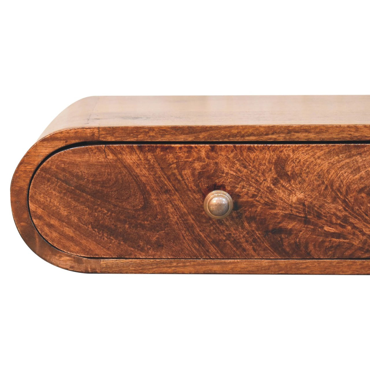 Close-up of the walnut-finish drawer front and round metal knob