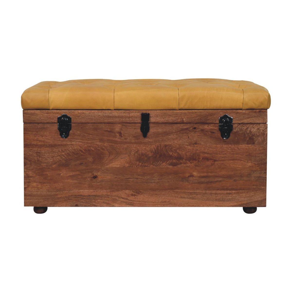 Honey caramel upholstered storage trunk in a straight-on front view on white.