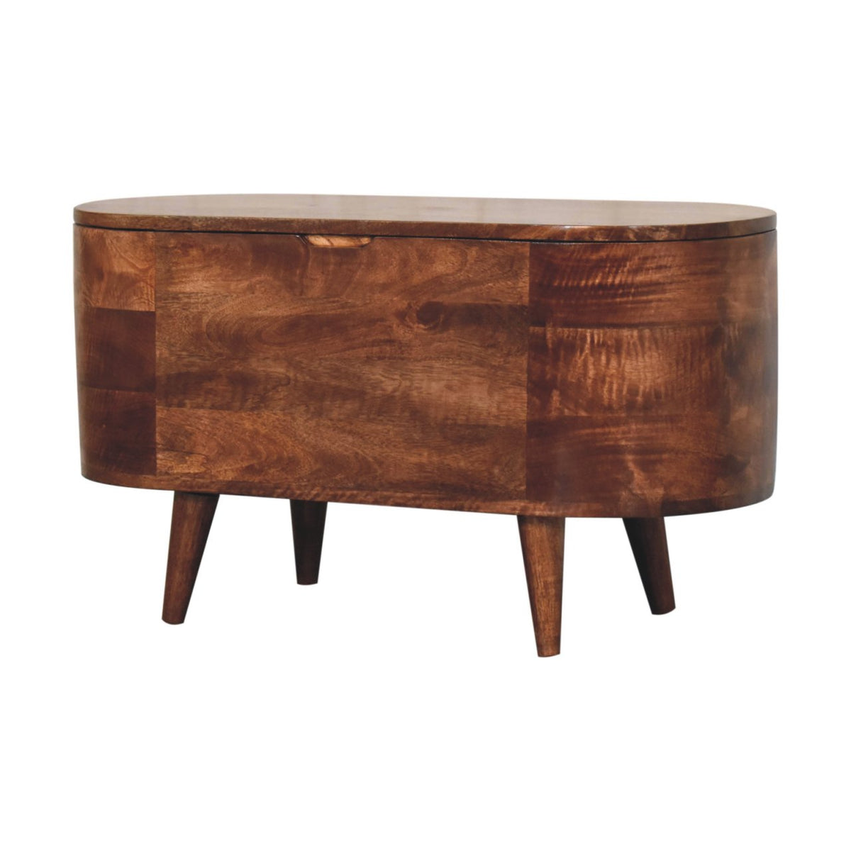 The blanket box from an angle, showing its curved side, wood grain, lid, and tapered legs.