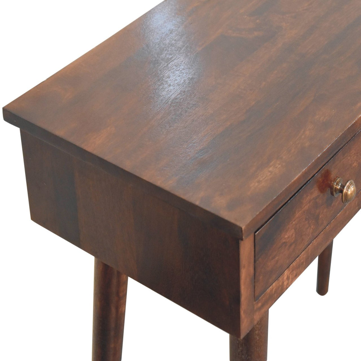 Close-up of the console table's walnut-finish top and side with a shiny drawer knob