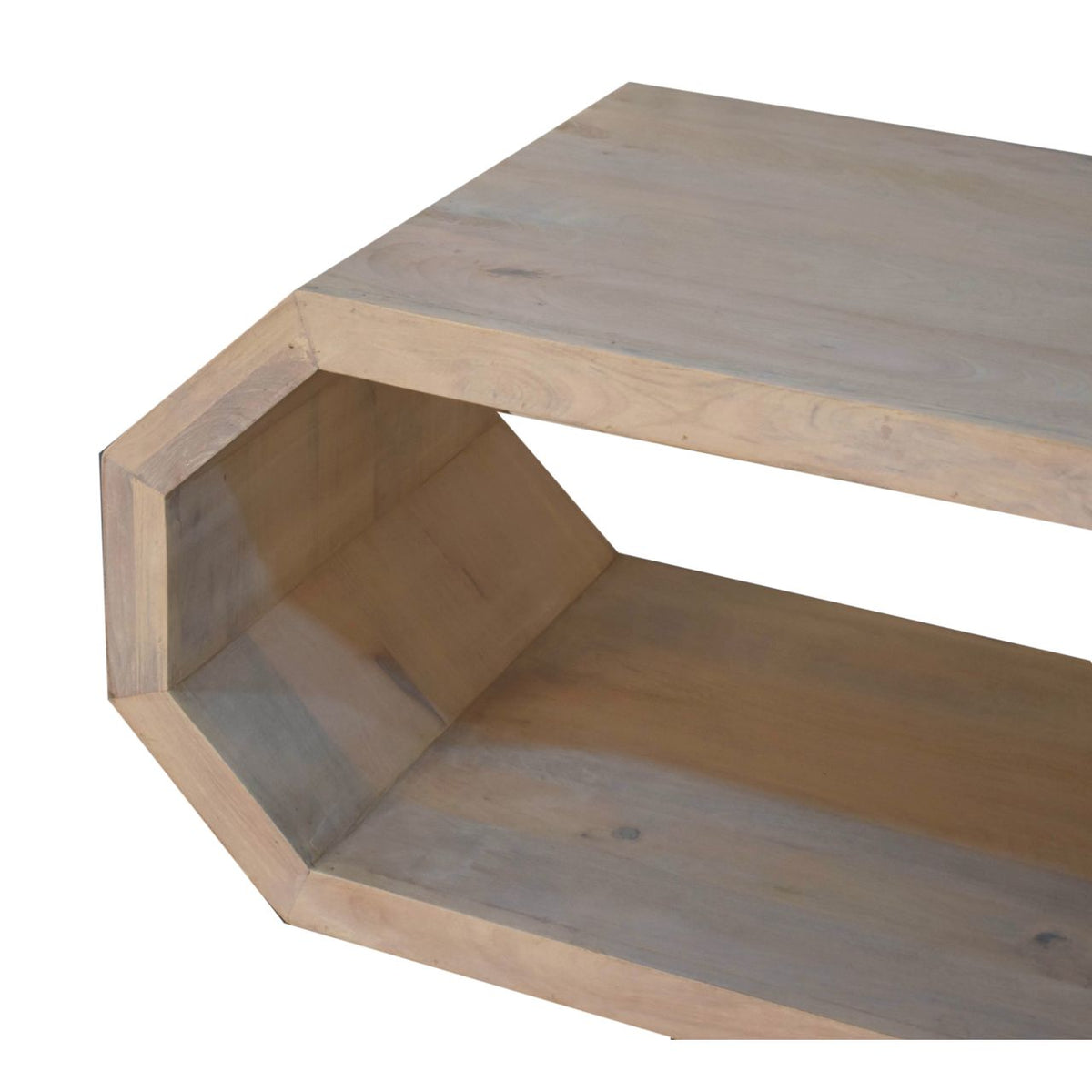 Close view of a light wood hexagonal table corner and open-frame structure