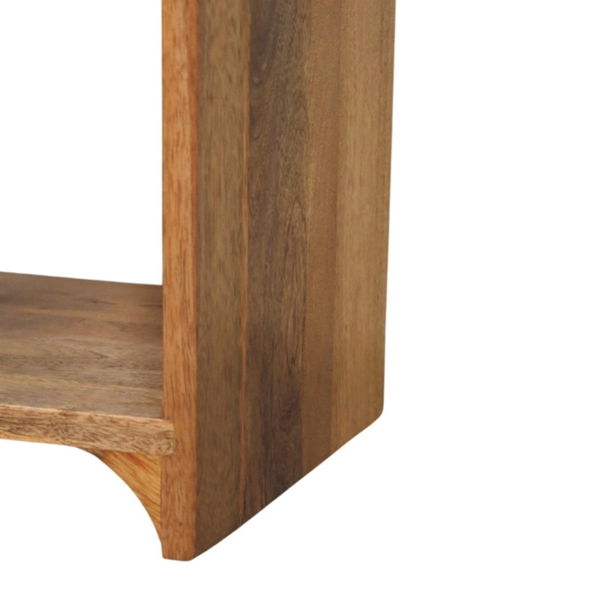 Side profile showing the tall wood panel and the edge of the open shelf.