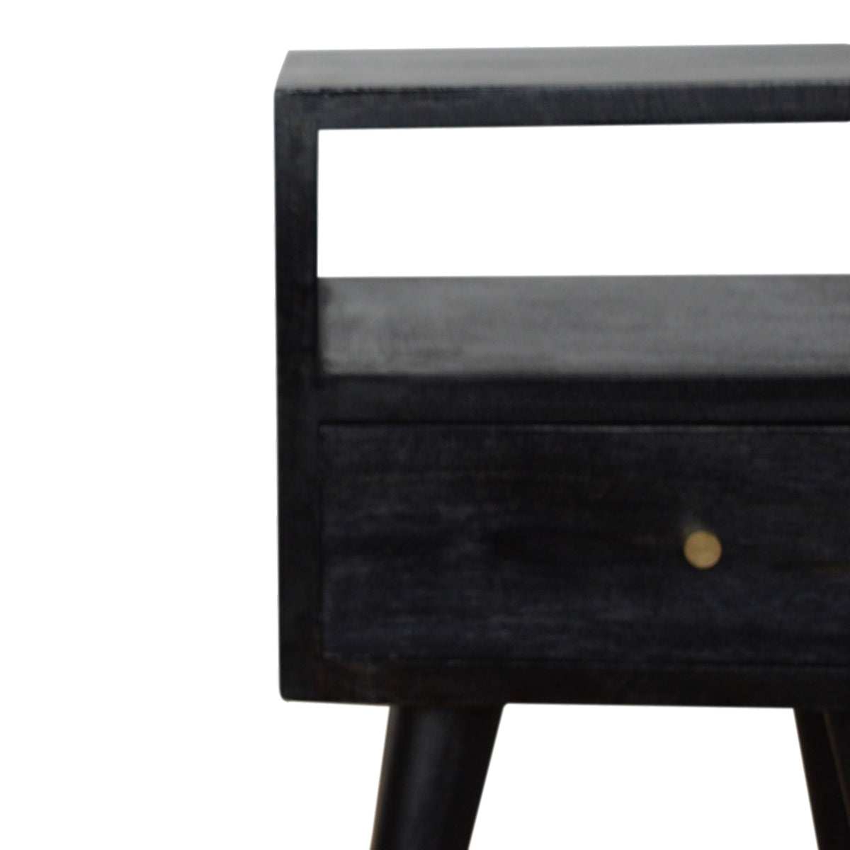 Close front view of the nightstand's open shelf, drawer and brass-colored knob