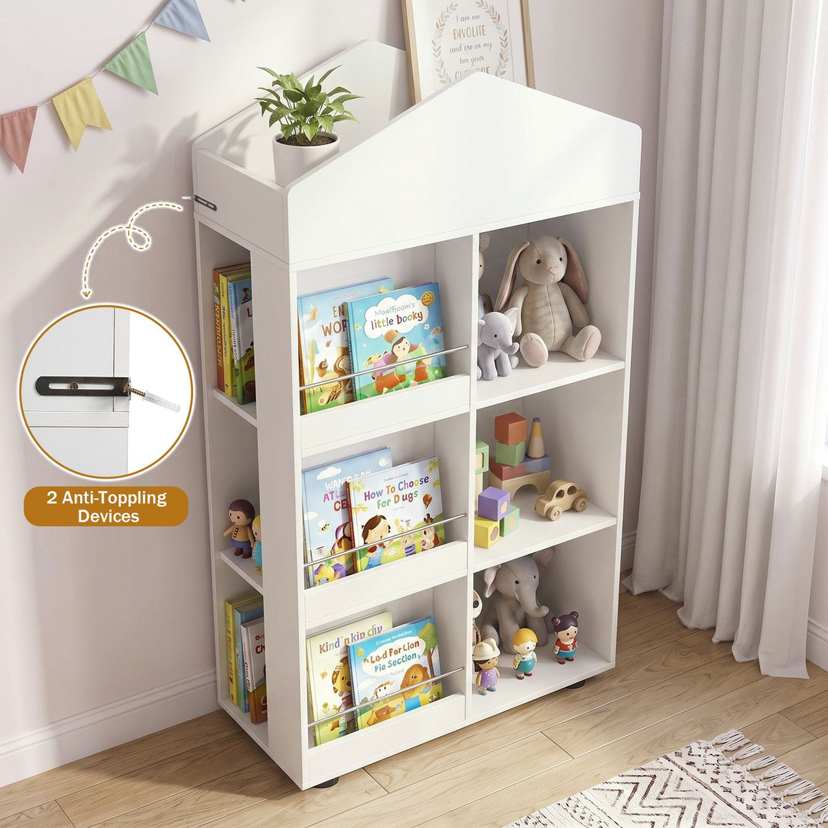 White house-shaped bookshelf filled with books and toys beside a curtained window.