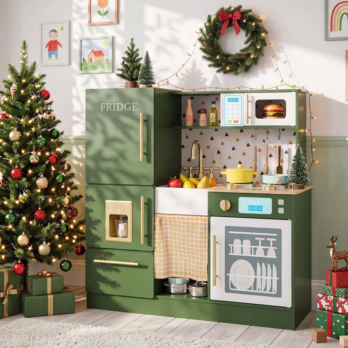 Green play kitchen staged in a festive room beside a decorated Christmas tree and presents.