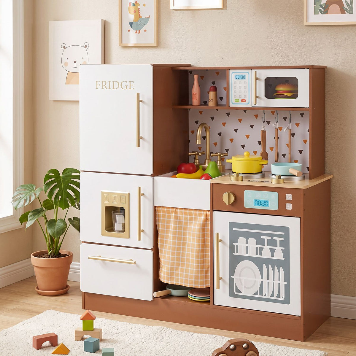 Play kitchen shown in a staged room, with a potted plant and toy blocks nearby.