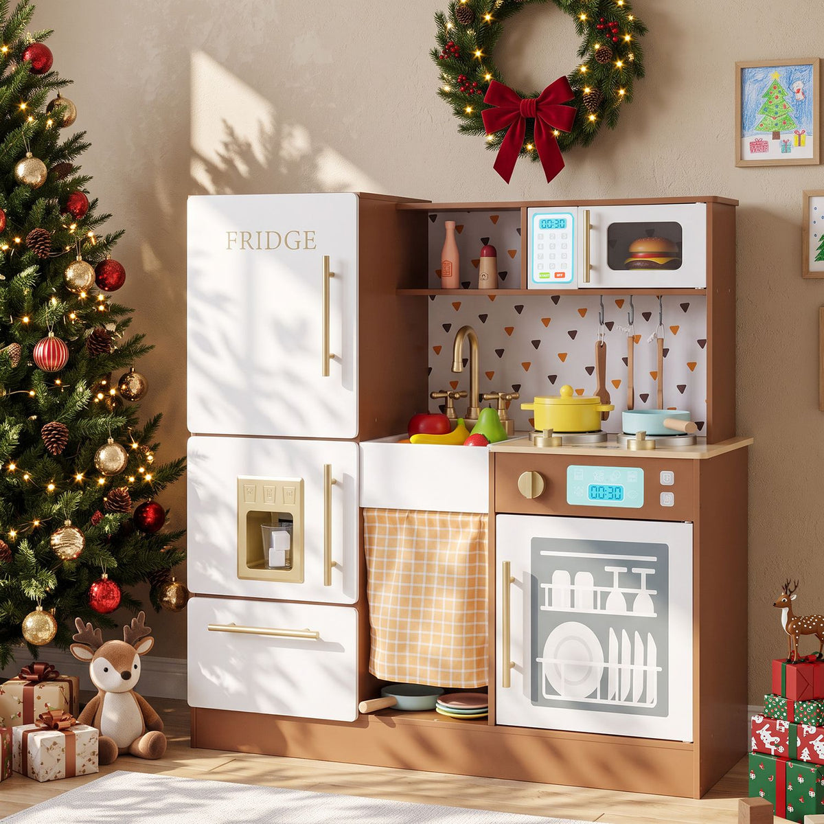 Children’s play kitchen displayed in a Christmas-decorated room, with toy dishes and food arranged on the counters.