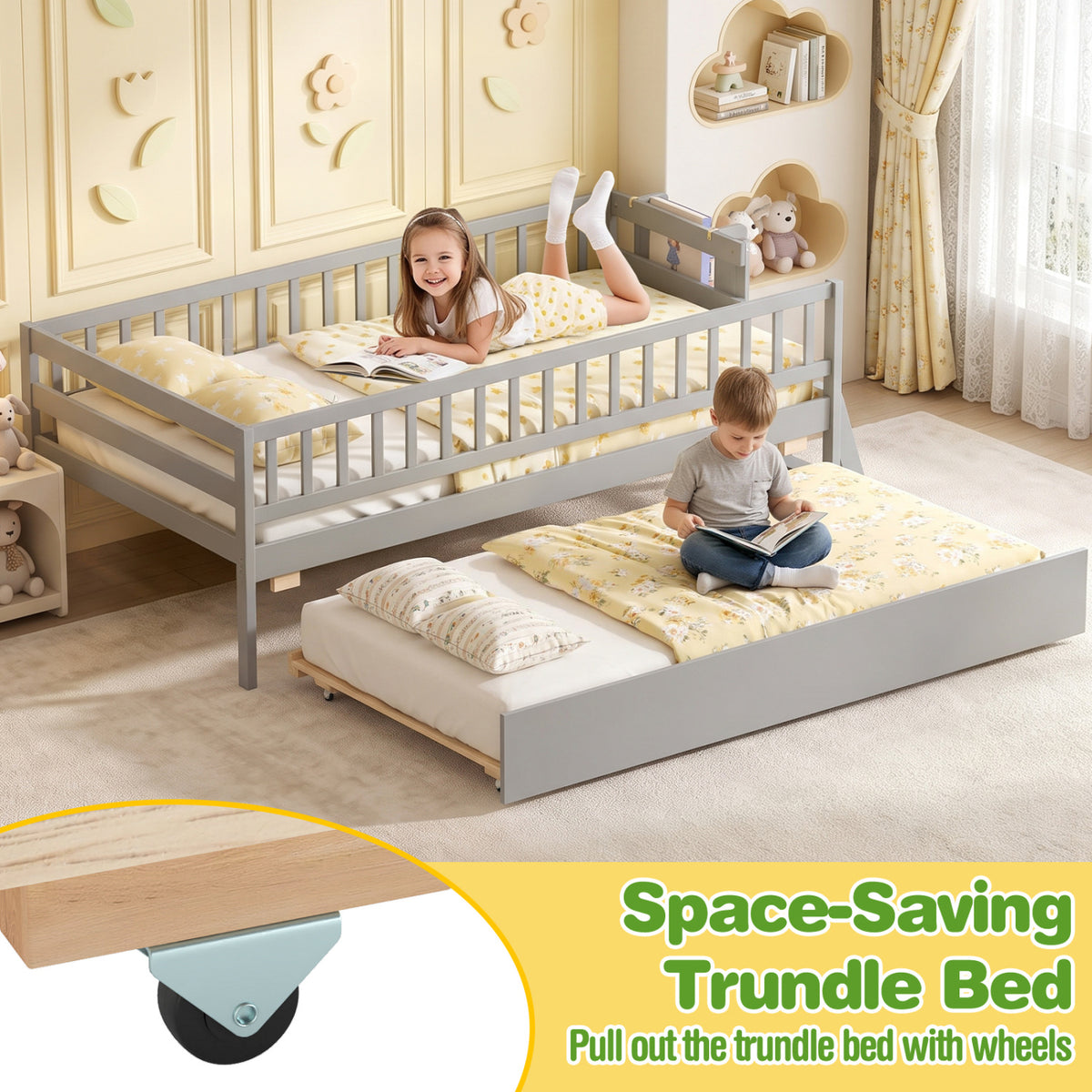 Two children relaxing on a gray bed and its pulled-out trundle in a bright bedroom.