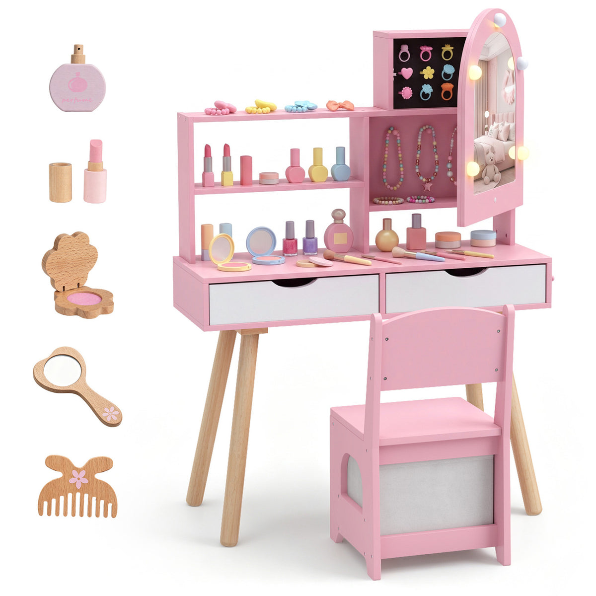 Pink vanity set and chair against a white background, with toy beauty accessories arranged beside it.