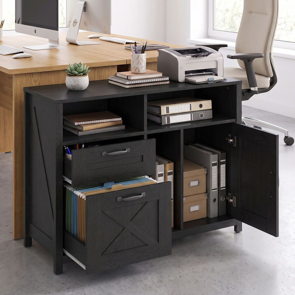 Black file cabinet with drawers pulled out and cabinet door open beside an office desk