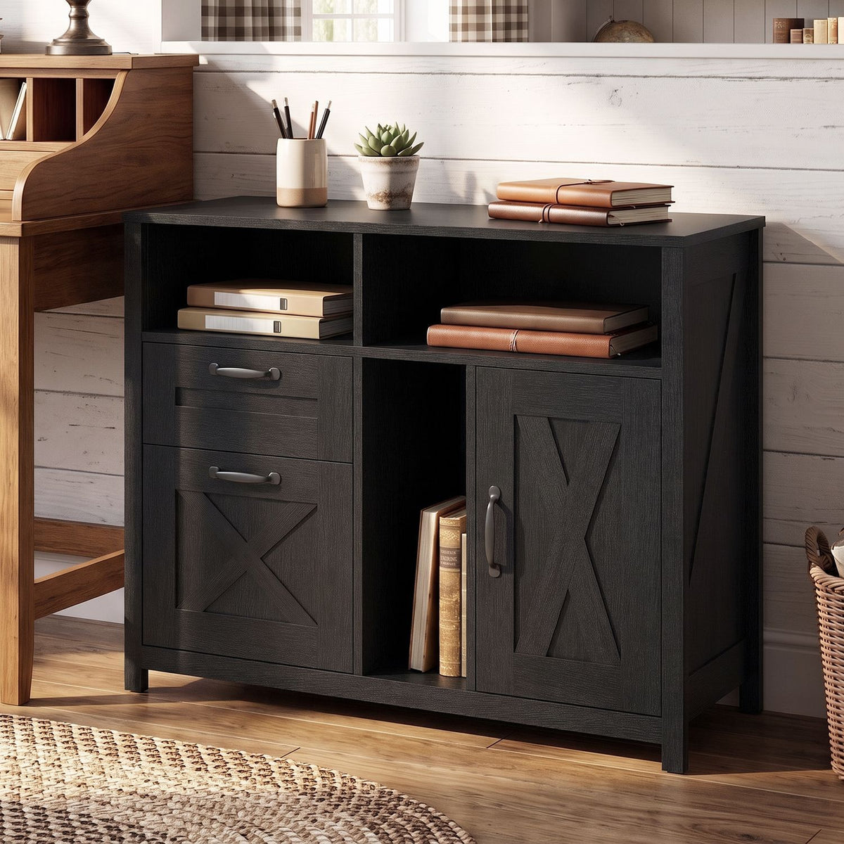 Black cabinet styled with books and decor in a bright room, with a drawer stack and a closed side door.