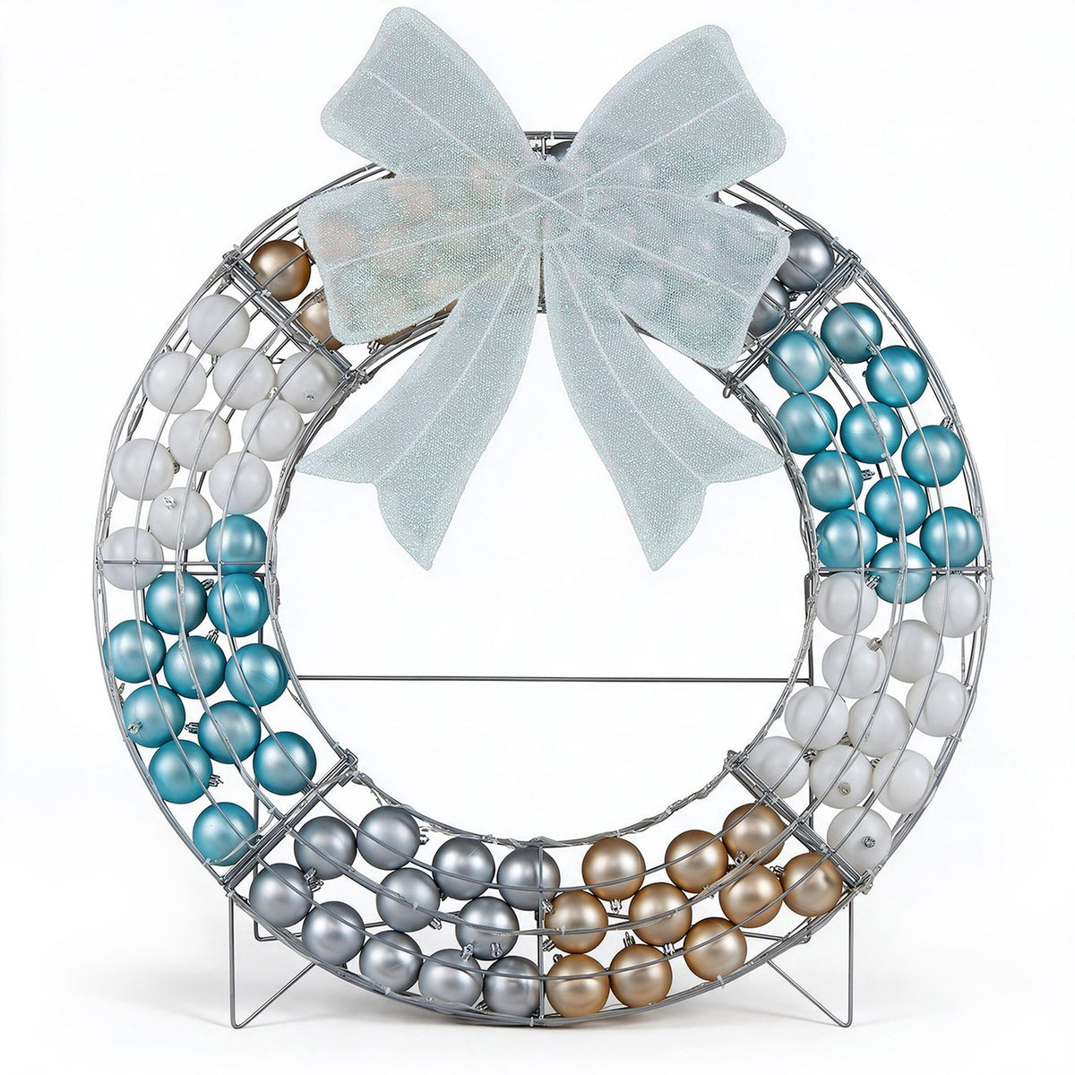 Front view of the wreath with a pale mesh bow and multicolor Christmas balls