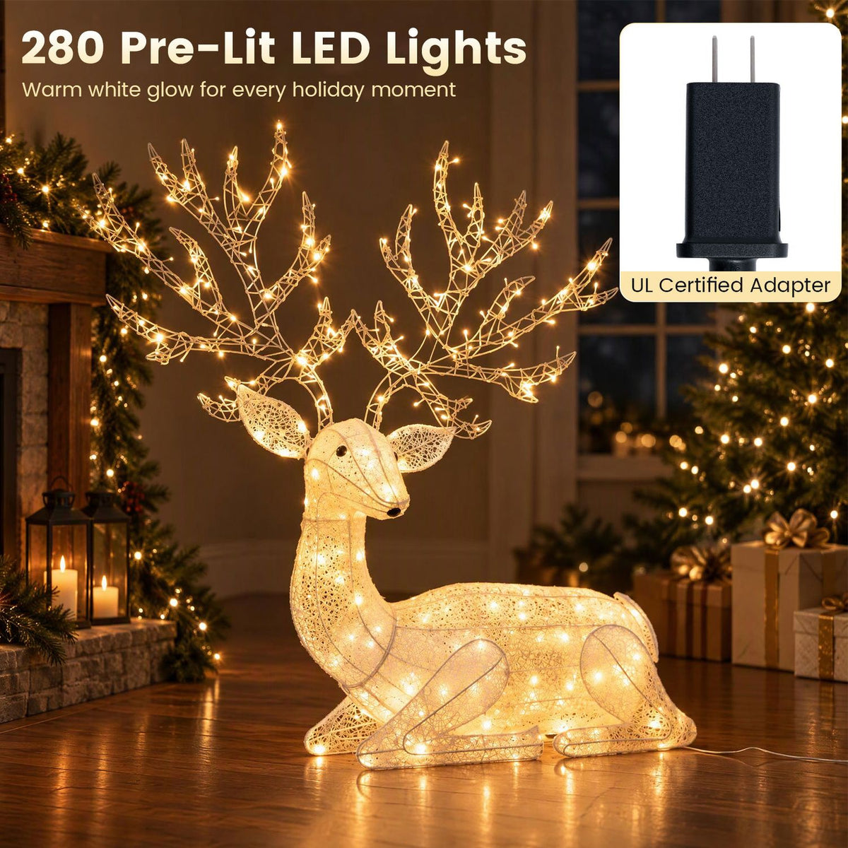 A lighted reindeer kneels in a warmly decorated room, with a black power adapter pictured in an inset.