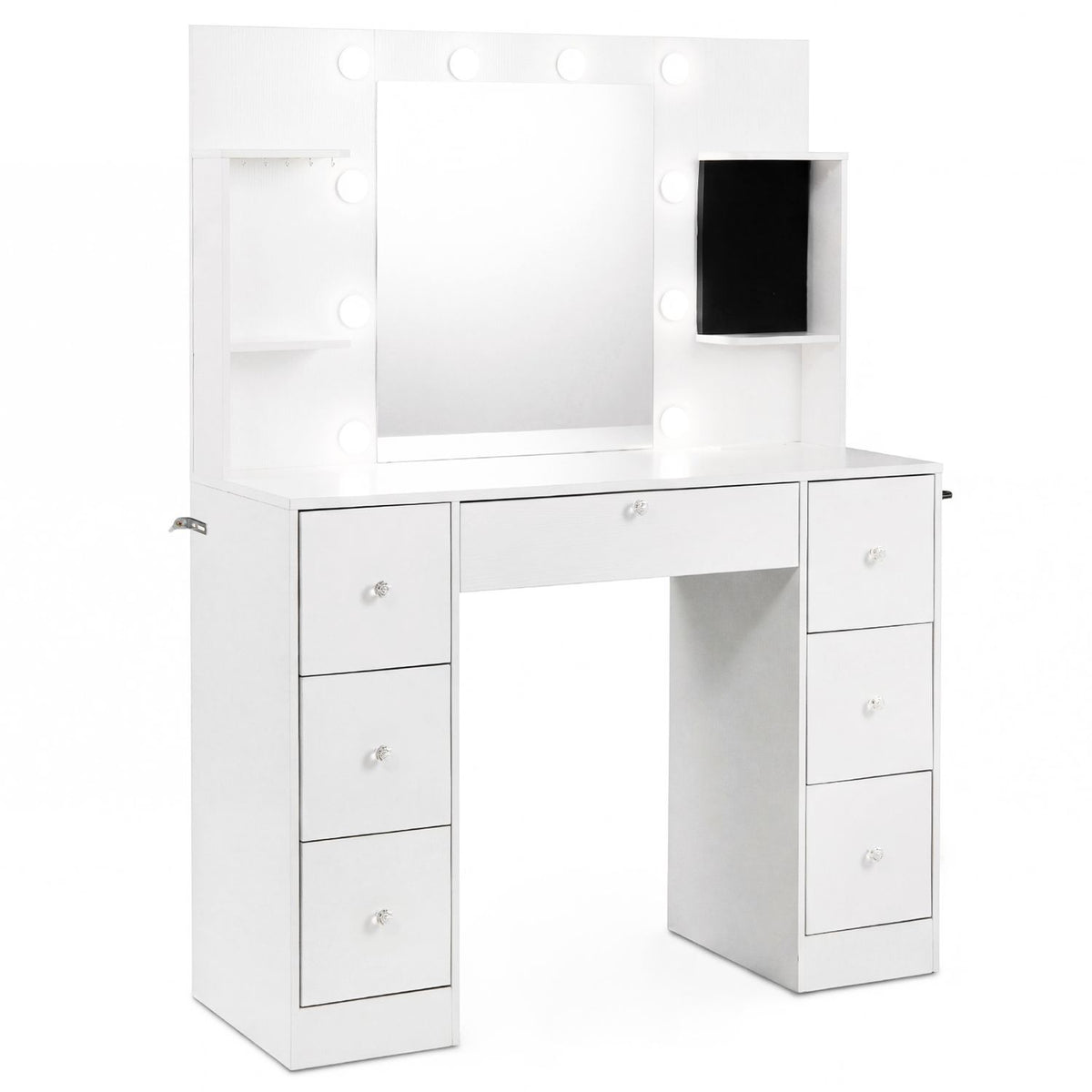 White vanity with bulb-framed mirror, open side shelves, a dark rectangular panel, and closed drawers.
