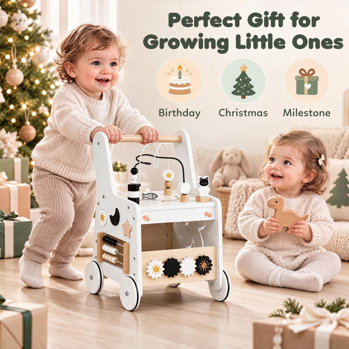 Two toddlers sit and stand beside a white activity walker, with festive gift icons above them.