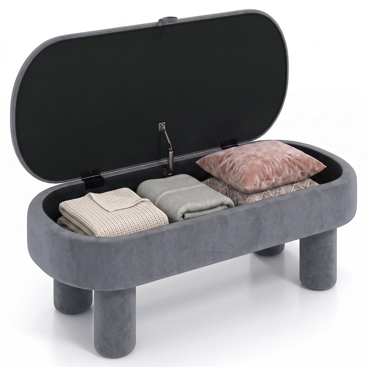 Open gray bench showing its dark-lined interior filled with folded textiles and a pillow.