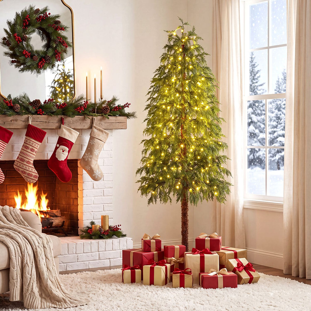 Green artificial tree glowing with warm lights beside a fireplace and holiday gifts