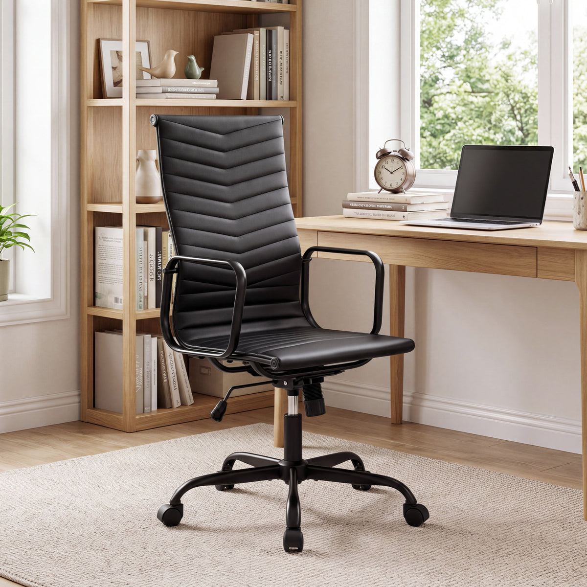Black ribbed office chair in a bright home office beside a wooden desk and bookcase.