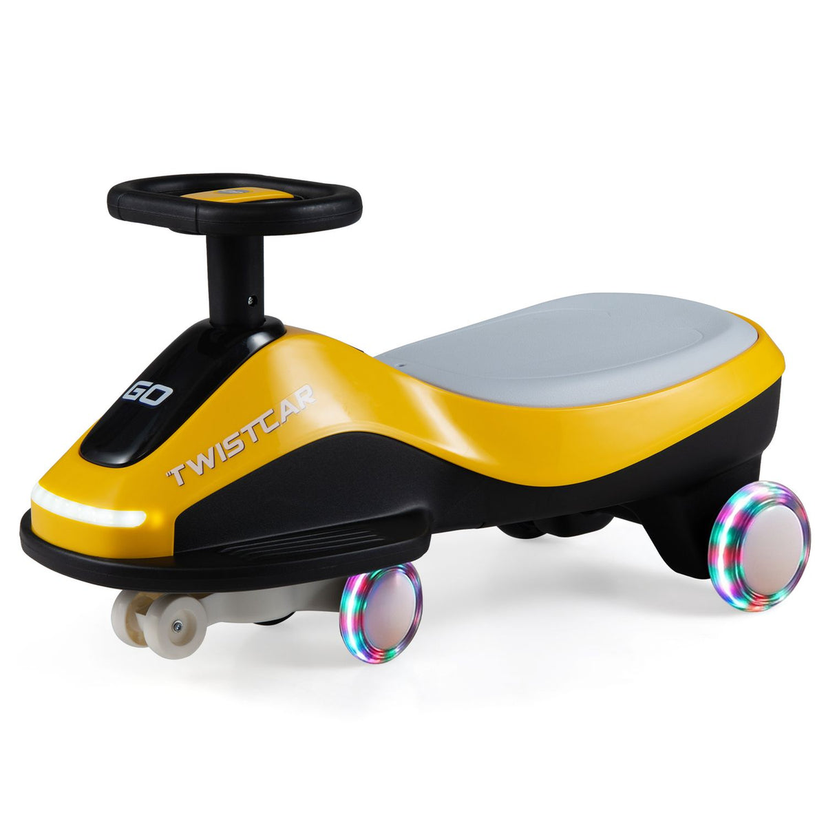 Yellow and black ride-on car shown alone from the side, with a gray seat, steering wheel, and front light.
