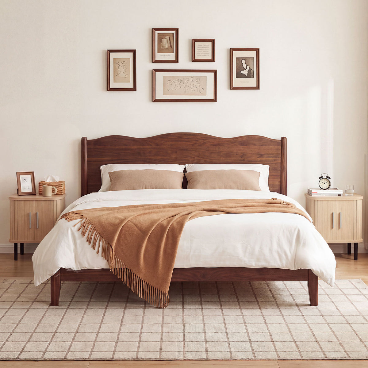 Matching fluted nightstands flank a bed, each topped with small decorative accessories.