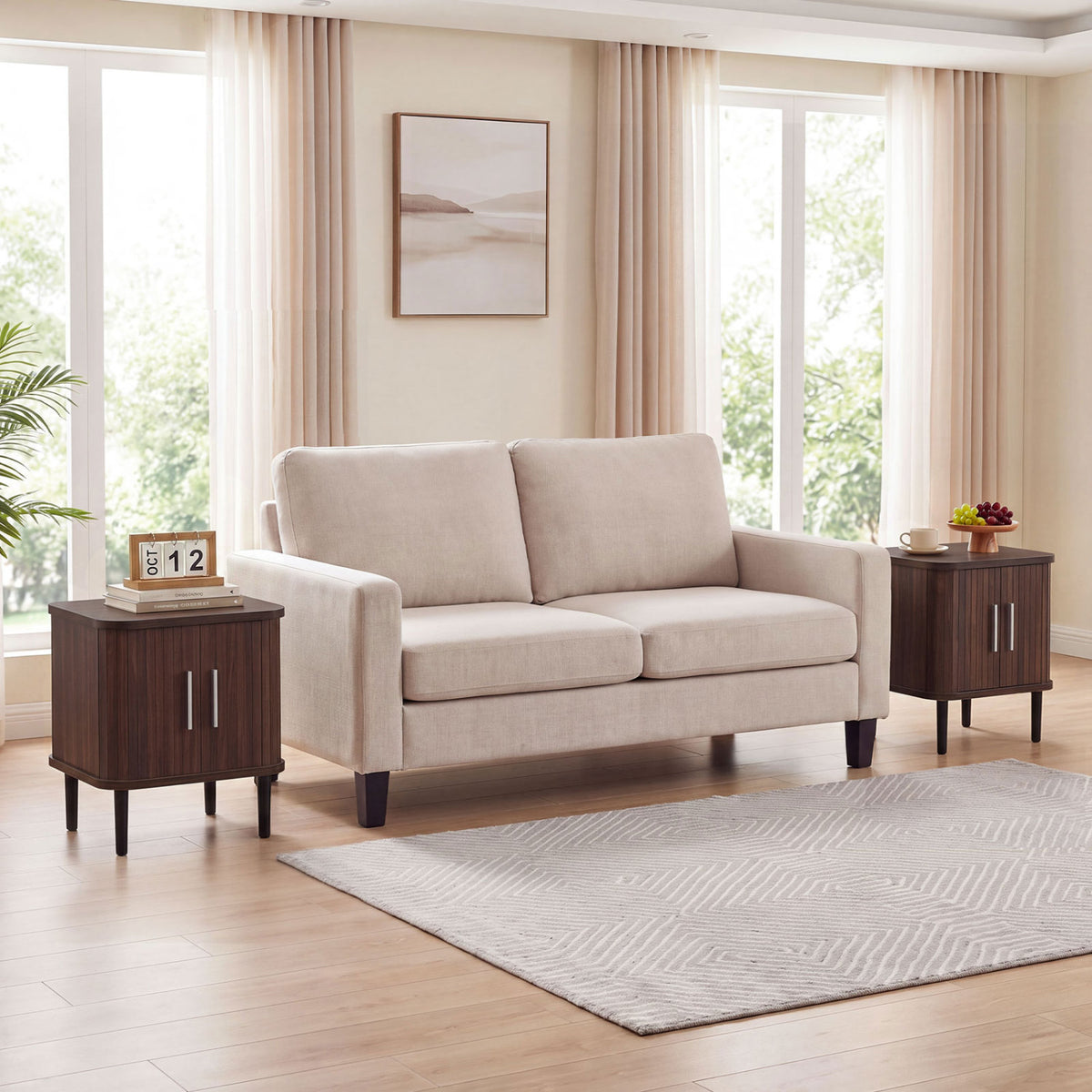 Pair of dark fluted nightstands beside a beige sofa in a bright living room.