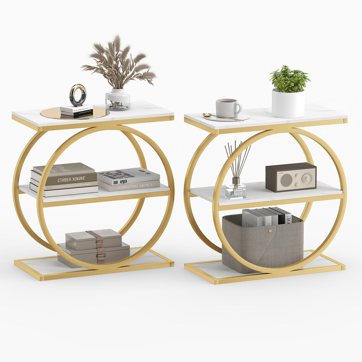 Two circular gold-framed side tables styled with books, plants, a mug, and small decorative items.