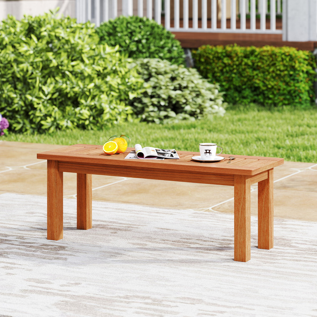 Low wooden slatted stand displayed on a patio with a lemon, a magazine and a cup on top.