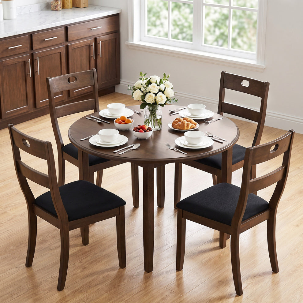 Walnut-finish dining chairs with dark upholstered seats around a round table