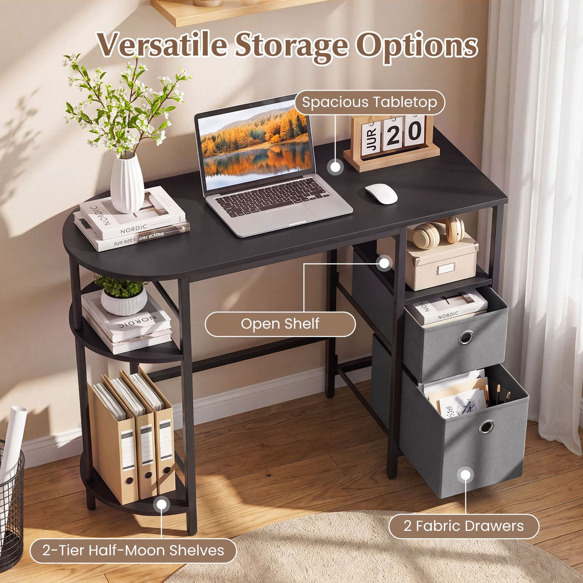Desk arranged with a laptop, books, plants, open shelves, and fabric drawers in a bright room.