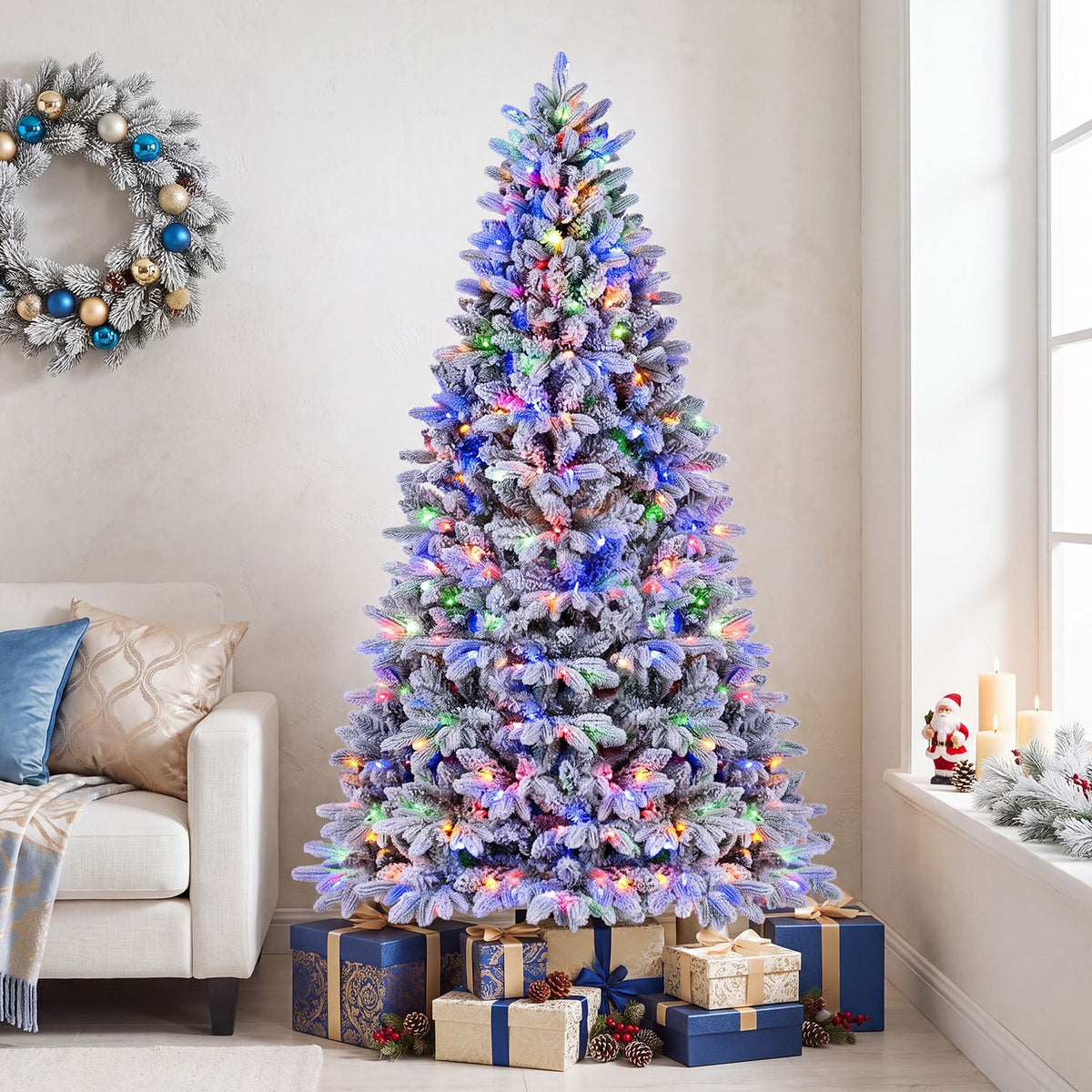 Snow-flocked tree glowing with multicolor lights in a living room