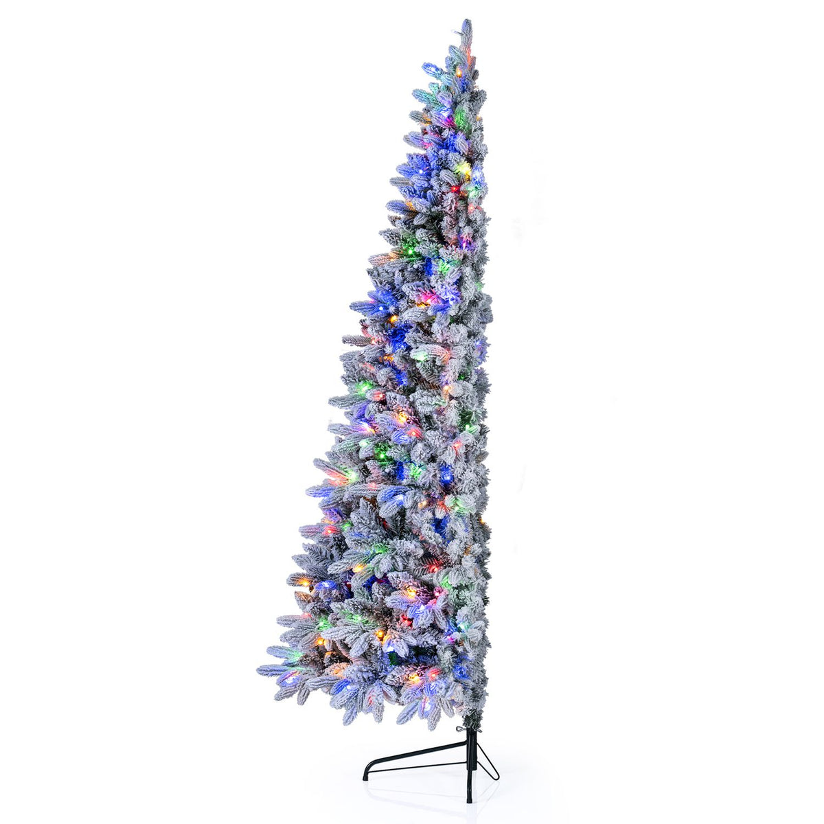 Narrow side profile of a snow-flocked tree with multicolor lights