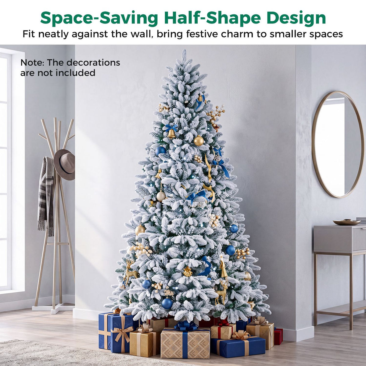 Snow-flocked half tree decorated with blue and gold ornaments, positioned against a wall among wrapped gifts.