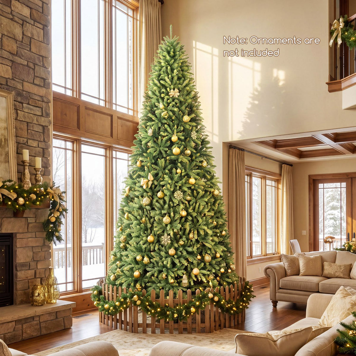 Tall green Christmas tree decorated with gold ornaments in a bright living room; a note says ornaments are not included.