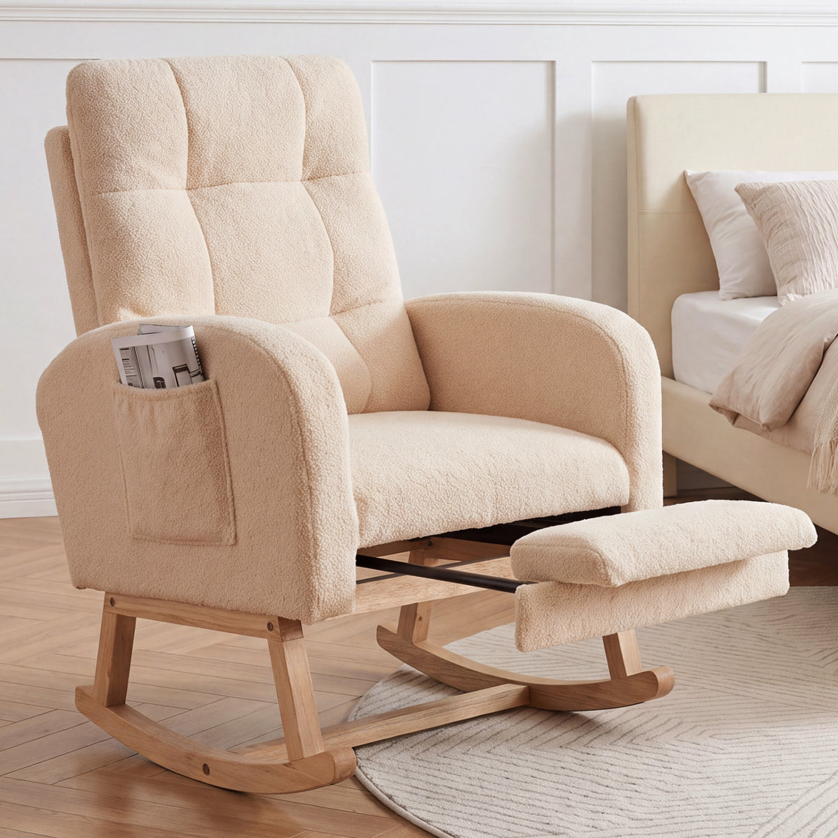 Beige rocking chair with footrest and side pocket in a bedroom