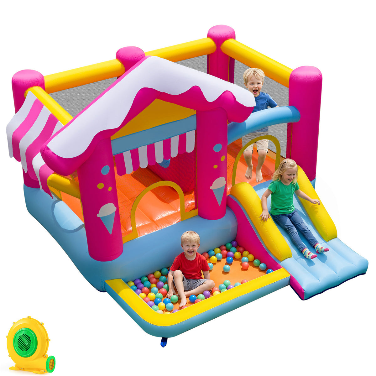 Three children play in the colorful inflatable bounce house, with one child sliding into a ball pit.
