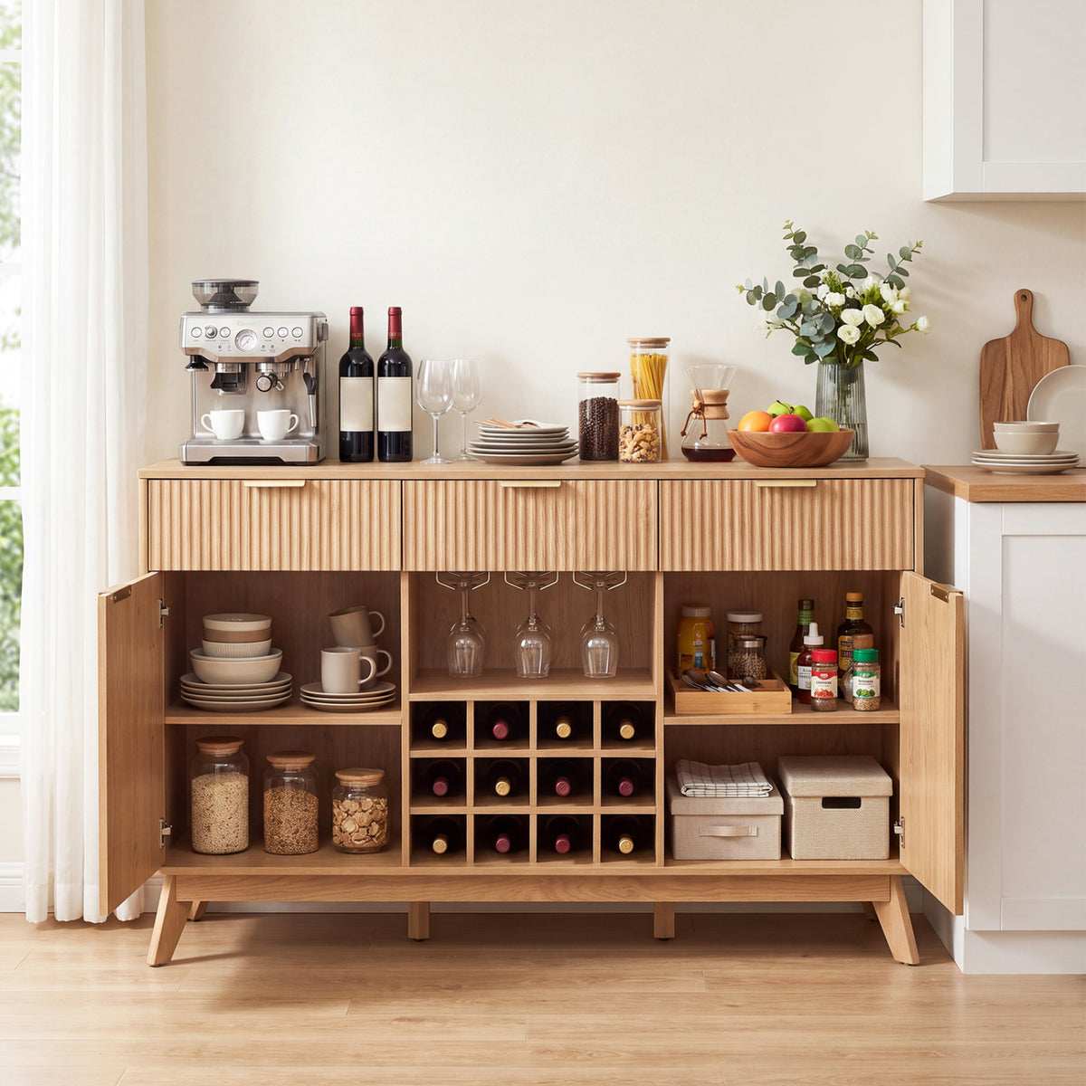 Cabinet doors open to show shelves, wine cubbies, hanging glasses, jars, and baskets.
