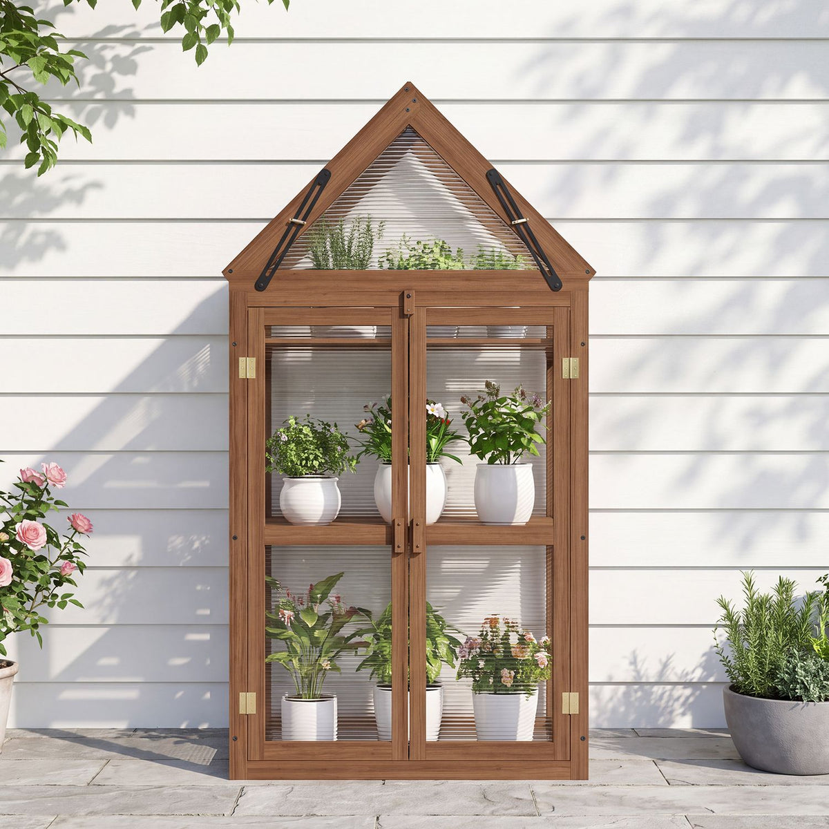 Closed wooden greenhouse with a peaked top and potted plants visible behind its translucent panels.