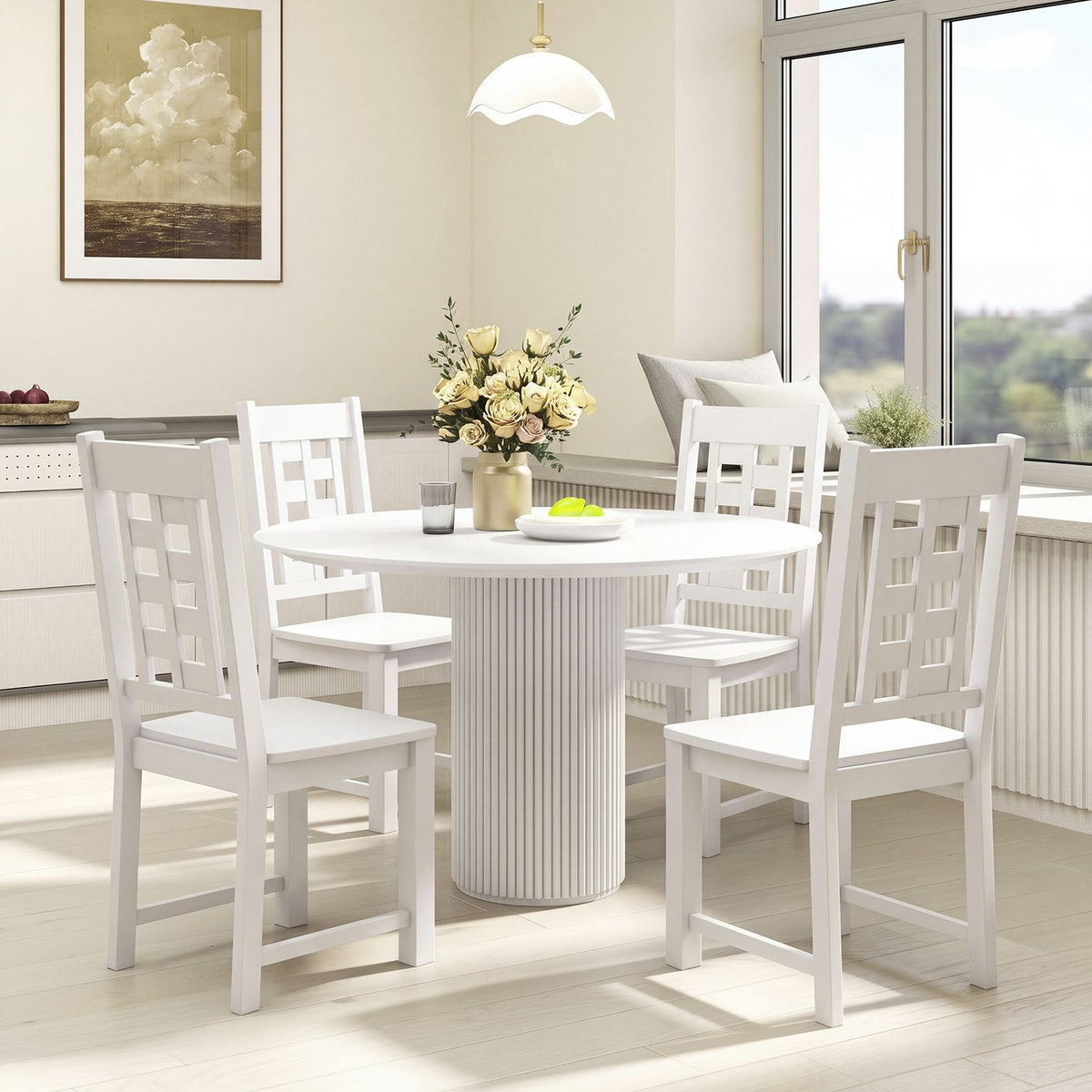 White open-back dining chairs arranged around a round table in a bright dining room